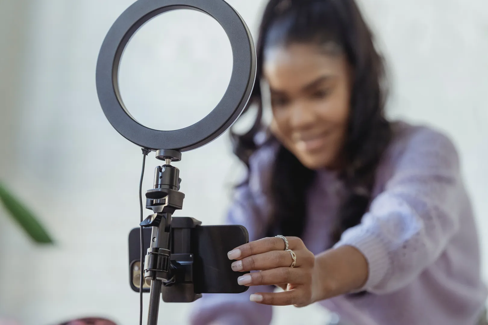 Lady setting up vlogging recording